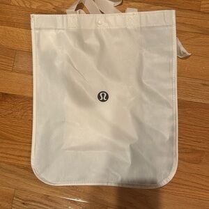 Lululemon reusable large shopping bag - black and white with snap.